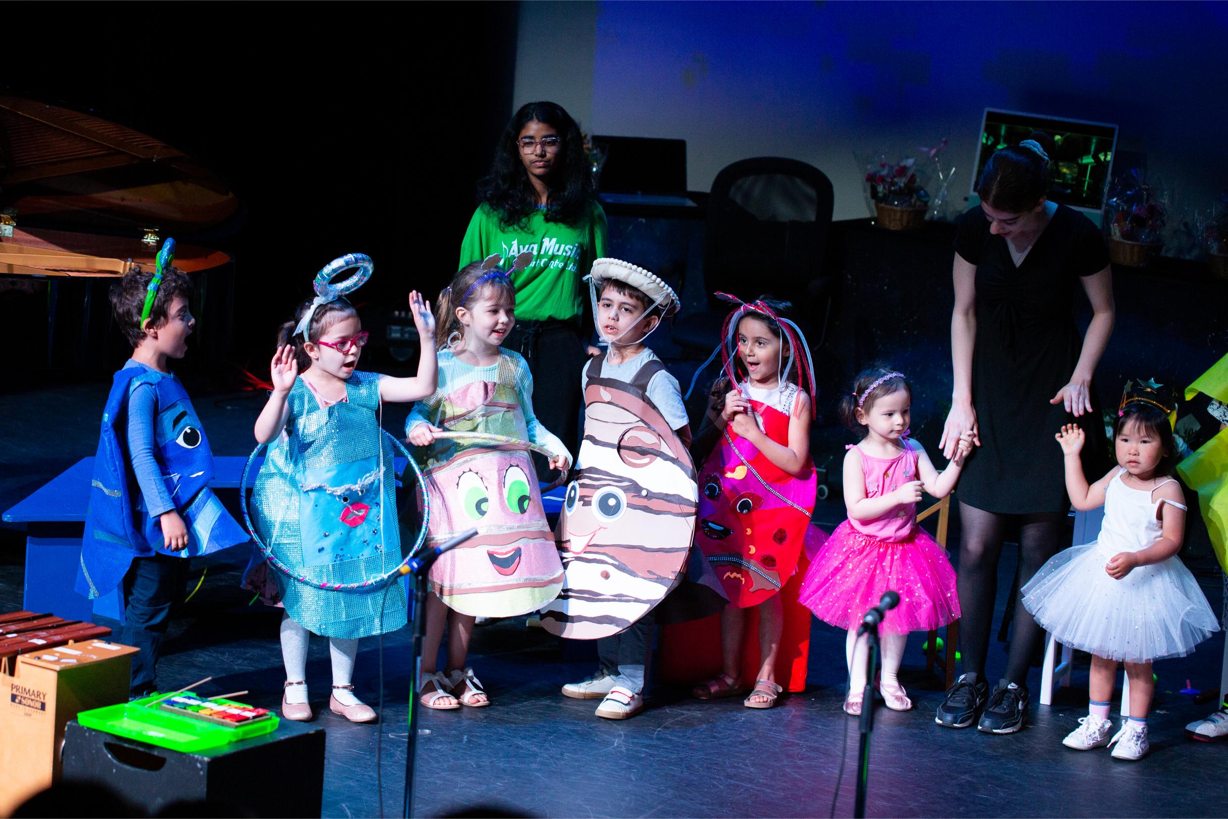 Young actors shining in a delightful kids' theatrical play