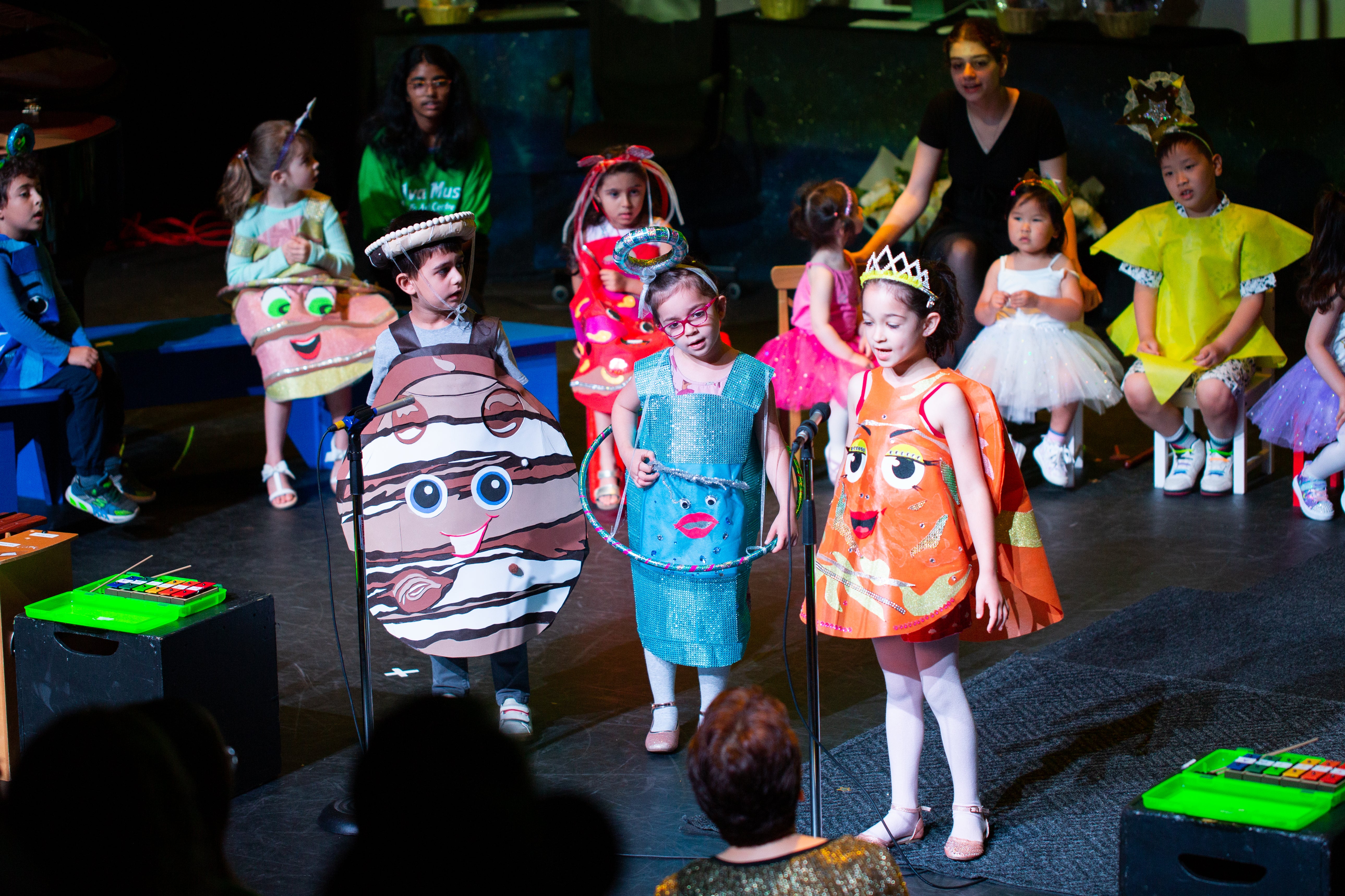 kids are trying their best at their stage performance