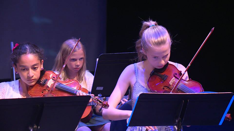 children playing violins