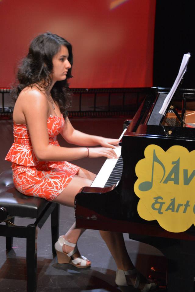 instructor playing piano