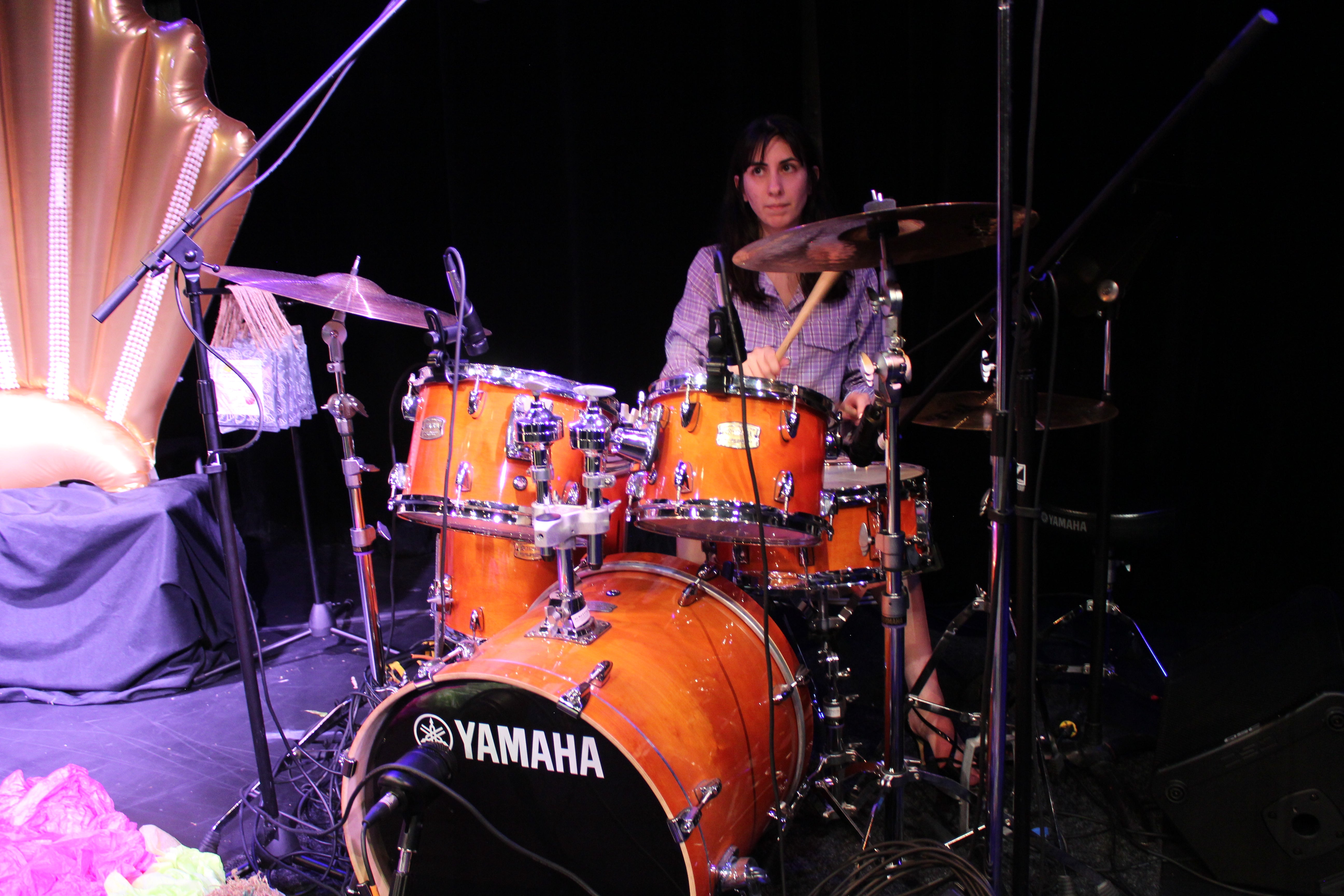 a talented teen handling the drums